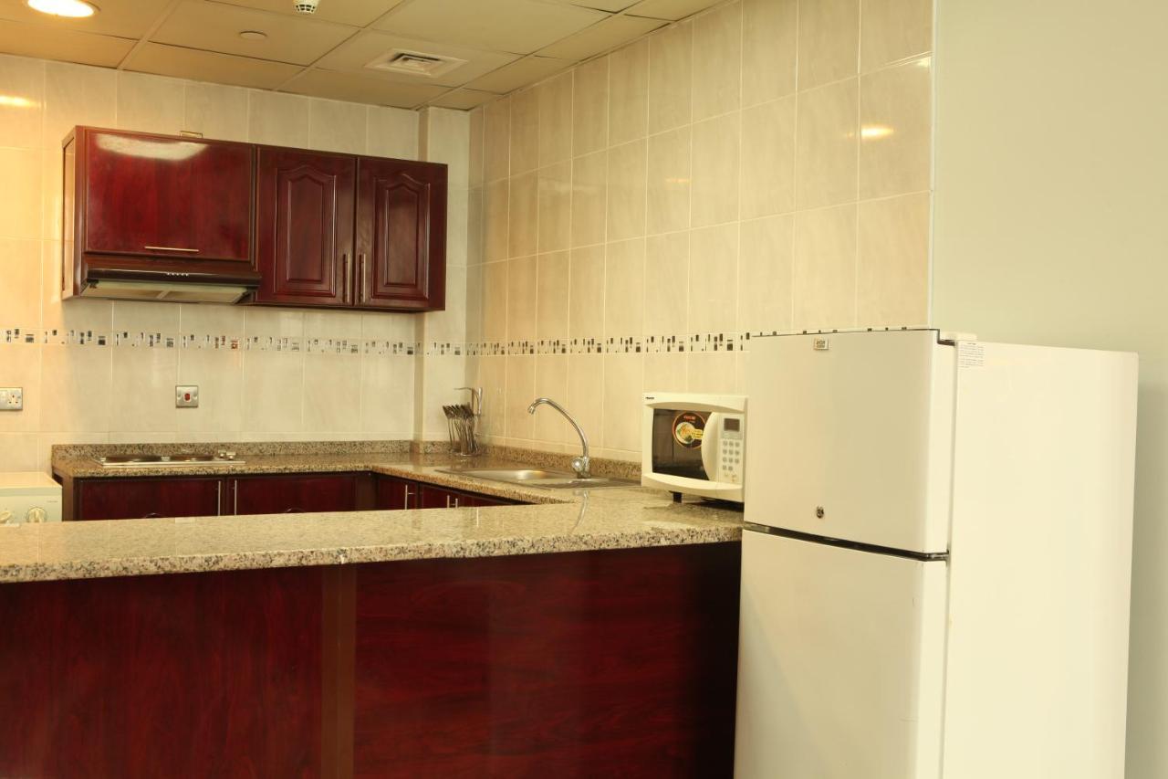 אבו דאבי Ramee Rose Hotel Apartments מראה חיצוני תמונה